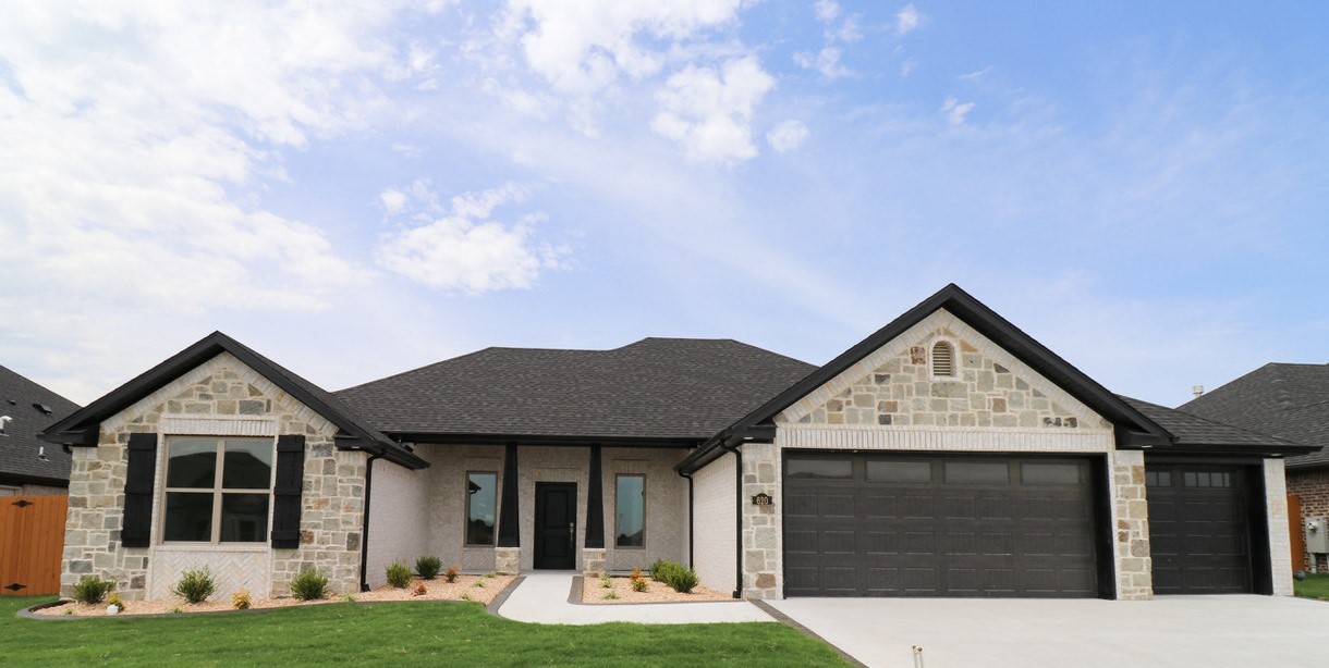 Gorgeous Cornerstone built home. This large 3 bedroom has over 2000 sq. ft. of living space. Custom cabinetry w/ soft close hinges, Quartz countertops, hardwood floors, large island bar & a walk in hidden pantry that you will love! Central vac, tankless hot water, 3 car garage, hardwood floors. The coffered ceiling and crown molding designs are sure to impress! All the bells & whistles in another Cornerstone built home! Wonderful neighborhood, large privacy fenced yard and a covered back porch! Walking distance to schools!