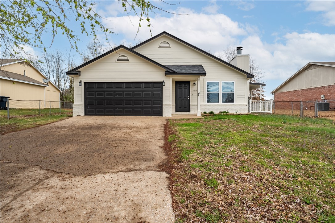 Completely remodeled three-bedroom, 2-bath, ~1167 square foot home in Central Rogers with a 2-car garage. The list of updates includes a new roof, windows, flooring, paint inside and out, cabinets, countertops, stainless steel appliances, and a garage door system with wifi opener. Wood laminate in living room and bedrooms. Beautiful tile in the kitchen, laundry, and bathrooms. Ceiling fans in all bedrooms. The master bedroom has a large walk-in closet. Nice, covered deck perfect for grilling and sunroom. Chain link fenced backyard. Rogers Public Schools, home is located near Elmwood Middle School & New Hope Road. All appliances, excluding the washer and dryer, are included. $1,650 security deposit