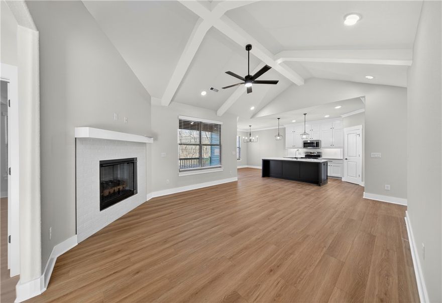 Welcome To Your Next Home! This One Checks All The Boxes — And Then Some. Covered Front Porch, Covered Back Patio, Brick Front, Sodded Yard, And An Upgraded Moisture Barrier So You Know It’s Built Right. Inside You’ll Find A Smart Split Floorplan With 9-Foot Ceilings, A Vaulted Living Room With Beam Accents That Opens Everything Up, And A Kitchen That Just Works — Custom Cabinets, Quartz Counters, Tile Backsplash, Bar-Top Island, Pantry, And A Dining Area. The Primary Suite Has A Tile Shower, Dual Vanity, And A Walk-In Closet In Primary Bath. Bentonville Schools, Easy Access To 71B, And Literally Surrounded By MTB Trails — It’s The Perfect Mix Of Style And Location. This One’s A Solid Win All The Way Around.