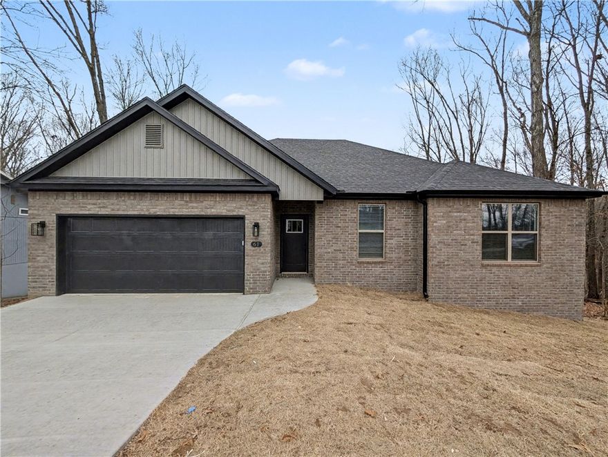 Welcome To Your Next Home! This One Checks All The Boxes — And Then Some. Covered Front Porch, Covered Back Patio, Brick Front, Sodded Yard, And An Upgraded Moisture Barrier So You Know It’s Built Right. Inside You’ll Find A Smart Split Floorplan With 9-Foot Ceilings, A Vaulted Living Room With Beam Accents That Opens Everything Up, And A Kitchen That Just Works — Custom Cabinets, Quartz Counters, Tile Backsplash, Bar-Top Island, Pantry, And A Dining Area. The Primary Suite Has A Tile Shower, Dual Vanity, And A Walk-In Closet In Primary Bath. Bentonville Schools, Easy Access To 71B, And Literally Surrounded By MTB Trails — It’s The Perfect Mix Of Style And Location. This One’s A Solid Win All The Way Around.