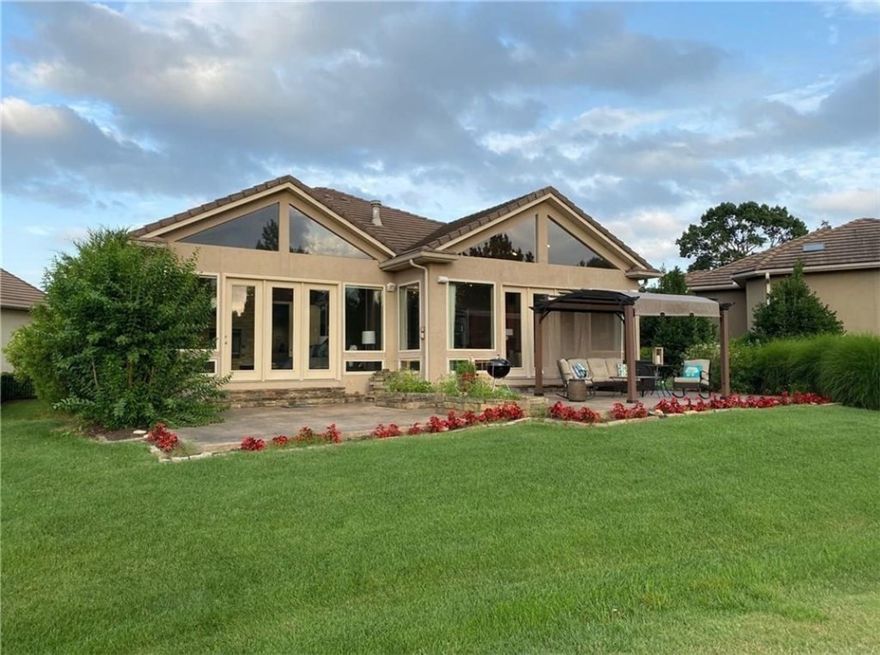 **Stunning Golf Course Living in Pinnacle Country Club** Experience the epitome of luxury living in this one-level home, perfectly positioned within the prestigious Pinnacle Country Club. This open floor plan boasts a striking wall of windows that floods the space with natural light while offering breathtaking views of the 5th and 6th Fairways of the golf course. The oversized master suite is a true retreat, featuring private patio access and a cozy double-sided fireplace, perfect for relaxing evenings. The spa-like master bath is equipped with a rejuvenating steam shower, ensuring a tranquil escape at home.