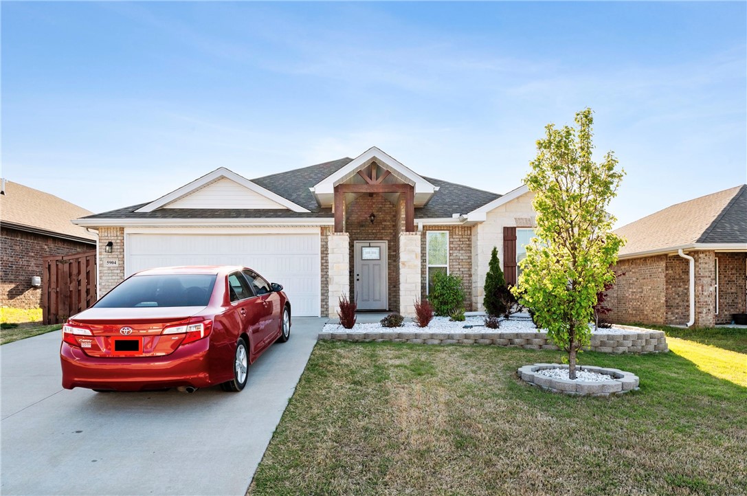 Fresh to the rental market!?Experience the curb-appeal of classic brick-and-stone architecture in this 3-bed, 2-bath home offering 1,759?sq?ft of open living space in the sought-after Bentonville School District. Inside, you’ll find a bright, seamless layout enhanced by LED lighting, granite countertops, walk-in closets, and a spacious pantry. Ceiling fans and 2" faux-wood blinds keep every room comfortable, while a dedicated laundry area provides full washer/dryer connections. Bonus features include attic storage. Outside, a level yard invites weekend relaxation or play. Located at 5904?Ettie?May?St, Bentonville, you’re minutes from schools, dining, and I-49. Available immediately—12-month lease minimum. Pets considered with owner approval. Schedule your tour today!