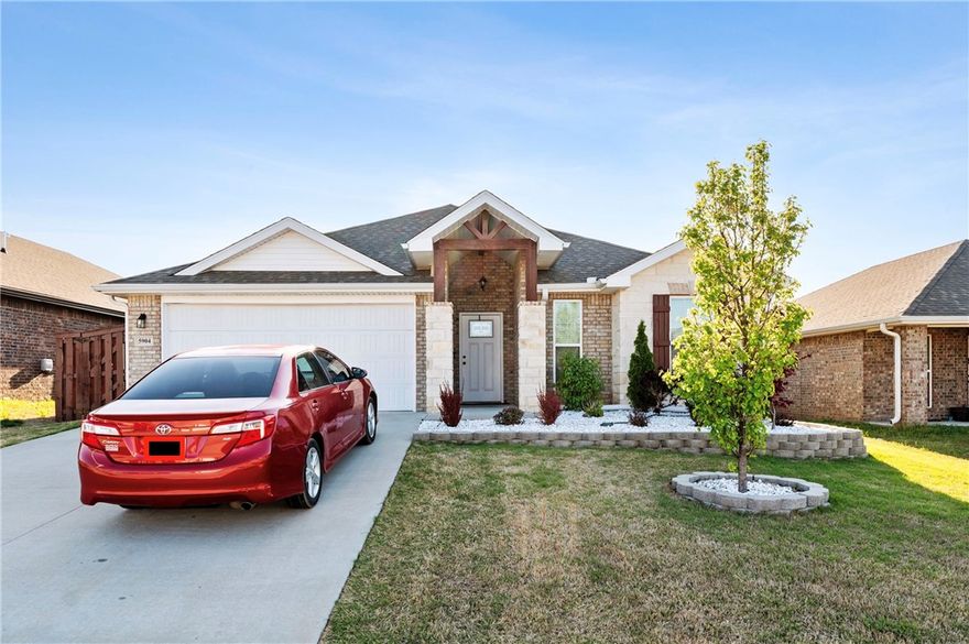 Fresh to the rental market!?Experience the curb-appeal of classic brick-and-stone architecture in this 3-bed, 2-bath home offering 1,759?sq?ft of open living space in the sought-after Bentonville School District. Inside, you’ll find a bright, seamless layout enhanced by LED lighting, granite countertops, walk-in closets, and a spacious pantry. Ceiling fans and 2" faux-wood blinds keep every room comfortable, while a dedicated laundry area provides full washer/dryer connections. Bonus features include attic storage. Outside, a level yard invites weekend relaxation or play. Located at 5904?Ettie?May?St, Bentonville, you’re minutes from schools, dining, and I-49. Available immediately—12-month lease minimum. Pets considered with owner approval. Schedule your tour today!