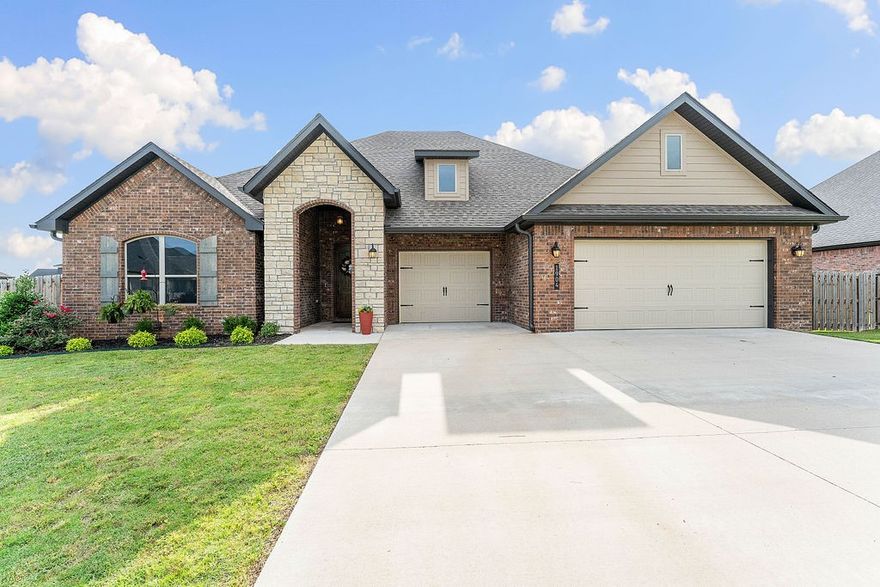 Find your home in beautiful Pea Ridge, one of Arkansas's fastest-growing cities! This luxurious and spacious 4-bedroom, 2-bath home was built in 2022. With features like high ceilings, crown molding, and custom living room shelves this home is move in ready. Whether you’re the chef or the designated taste tester this kitchen is just for you! The sleek granite island and ample storage are perfect for hosting gatherings. Large closets and framed-out attic provide plenty of storage space. The huge 3-car insulated garage suits vehicles, hobbies, or a home gym.

Even the smallest details of the home are mentionable features! Exterior outlets with indoor switches simplify holiday lights. The home is wired for security. The covered back patio is ready for a custom outdoor kitchen with outlets and a gas hookup.

Enjoy walking kids to school or heading to the community pool in this desirable Pea Ridge neighborhood!