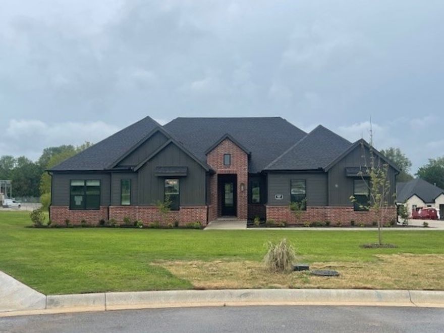 Precious Payton Plan - 4 Bedroom, with a Study/Game room,  3.5 Bathroom and a 3 Car Garage!  Fabulous back Patio.  Huge Walk in Pantry.  Luxurious Bedroom One with a fabulous en suite bathroom with a Walk-in Shower and Soaking Tub.  Kitchen boasts cabinet to ceiling cabinets, quartz counters, farmhouse sink and Kitchen Aid Stainless Steel Appliances with double ovens!  Black fixtures! LED Lighting! Ceiling fans!!  Mix of Brick and Hardie board exterior per plan. Asher's Ranch is an idyllic community nestled in the heart of Goshen, Arkansas, known for its picturesque landscapes and serene surroundings. The community boasts meticulously designed and built homes that are situated on expansive lots, with ample space for outdoor activities, gardening, and privacy. The homes are crafted to perfection, featuring modern amenities and elegant finishes that exude luxury and comfort. Come to Asher's Ranch and find your dream home today! Taxes TBD.
