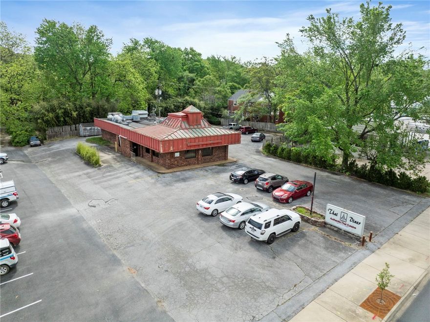 Turnkey restaurant for sale near the University of Arkansas! Features include a large furnished dining area and fully equipped commercial kitchen. With high-visibility along N College Ave, property has potential for various retail uses or redevelopment.

Owner has occupied for 23 years with proven success.
All furniture and equipment can transfer with sale.
Approx. 97 ft of road frontage & 25,000 CPD.
Large paved parking lot with all utilities on site.
Minutes from UofA, UAMS, VA Medical Center, & Dickson St.