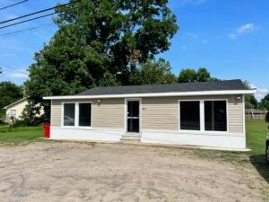 IMAGINE YOUR SIGN HERE! UPDATED PROPERTY, PERFECT FOR NEW BUSINESS IN DARDANELLE. This 1400 sf commercial property is centrally located and has great potential for many business ventures. Completely remodeled including new paint inside and out, new flooring and updated bathroom and break room area. Located on a large lot with parking in front.