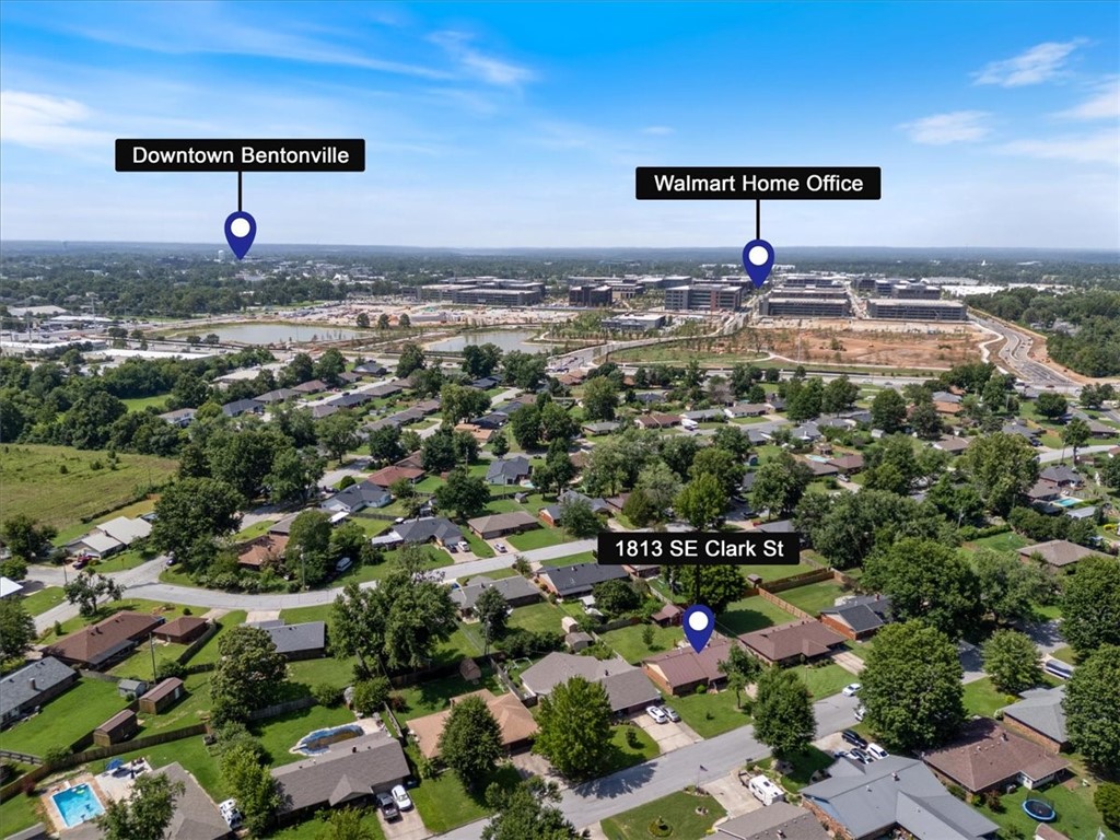 Prime Location near the heart of Bentonville with endless possibilities now available! Whether you're looking to move right in, invest in a long-term rental, build your dream home, or tap into the Airbnb market, this location can’t be beat.
Just minutes from downtown Bentonville and directly across from the new Walmart Home Office campus, this 3-bedroom, 2-bath home sits on a spacious 0.24-acre lot with endless possibilities!
The recently updated kitchen features quartz countertops and upgraded cabinets with soft-close doors, fresh paint, and modern hardware. You'll also appreciate the oversized 25x20 garage—perfect for storage, hobbies, or extra parking.
The fully fenced backyard includes a storage building and plenty of space to relax or expand.
Close to walking and biking trails and convenient to everything Bentonville has to offer—don’t miss this rare opportunity!