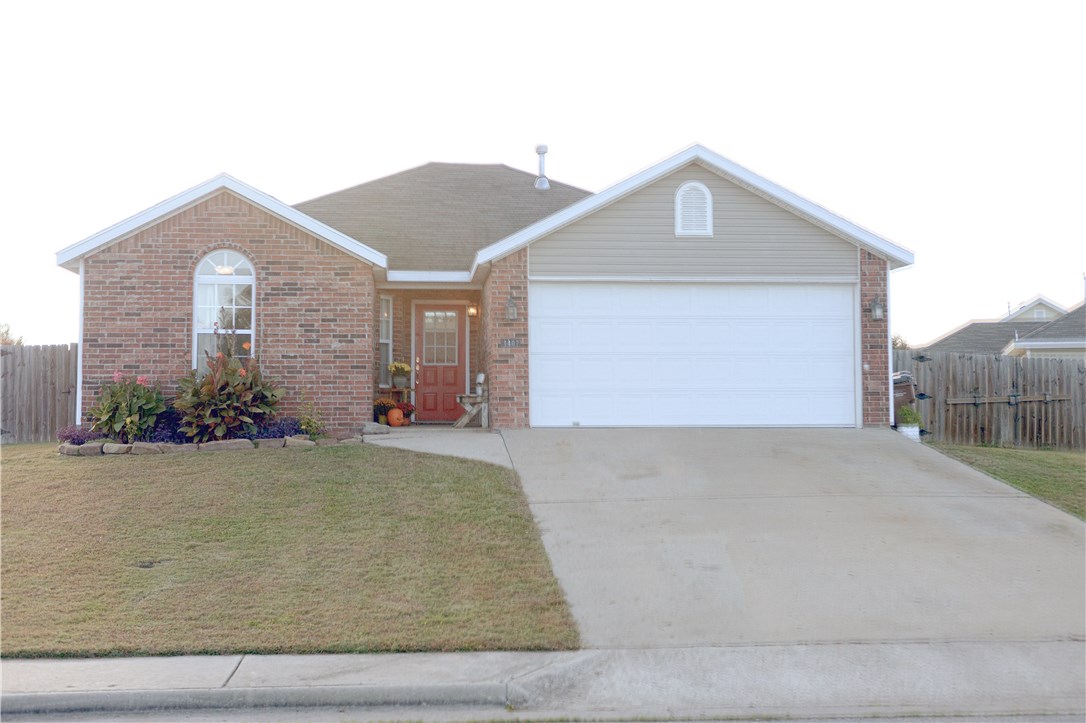 Lots of features packed into this cute-as-a-button home! Living room w/new engineered hardwood floor, 12' vaulted ceiling, gas log fireplace w/mantle, door to patio. Cheery galley kitchen & dining nook. Ceiling fans, 2" blinds, fresh paint throughout. Master suite has tray ceiling, bay window, updated bath w/mini-subway tile, walk-in closet. Laundry room with storage, coat & linen closets. Brick & vinyl exterior, double-pane windows, wood privacy fence around large 0.31 acre corner lot, and so much more!