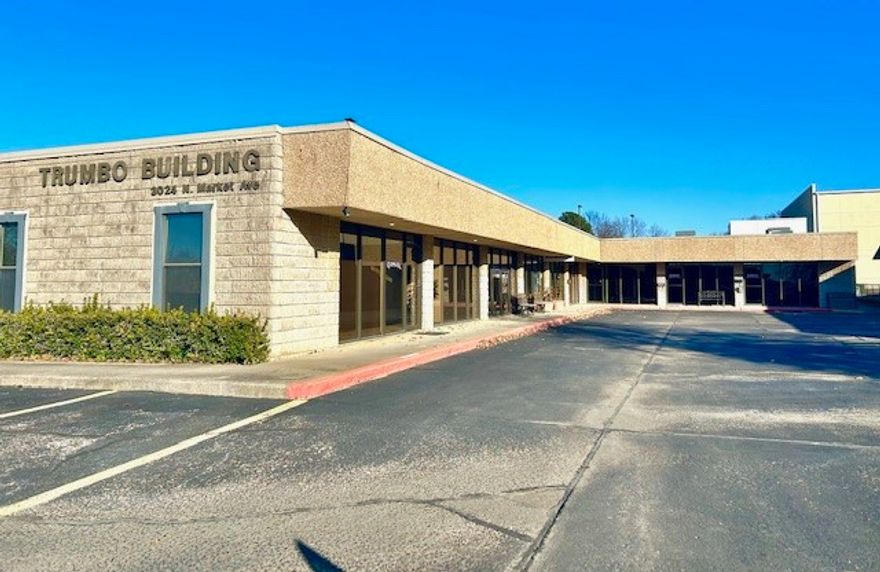 The Trumbo Building has been a well known north Fayetteville office building since 1976.  The space features a front door facing the main parking lot and has an overhead door in the back (east side).  This space would be excellent for an office/warehouse or storage environment in the middle of town.  Industrial or heavy usage warehouse would not be suitable, but an office/light storage usage would be good.  Landlord offering a modified gross lease with tenant paying for their electric, gas and other business utilities.  Tenant improvement allowance is negotiable.  A floor plan is available upon request. 
 This space is also listed as office lease space available on MLS #1281906.