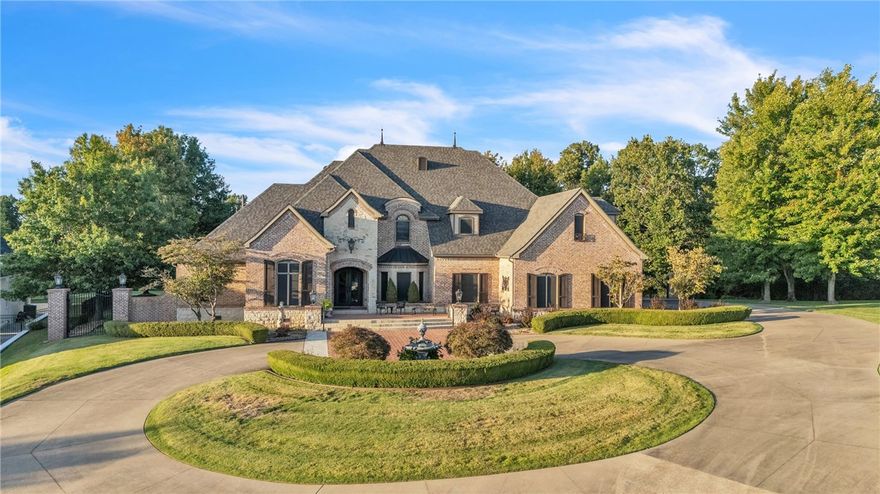 The crown jewel of Northwest Arkansas golf course living, now offered for sale. An unparalleled opportunity to own one of the most coveted golf course estates in Northwest Arkansas. This European French–inspired residence blends elegance with comfort on a stunning golf course lot behind the private gates of Clear Creek. Inside, the main level features a stately office and a spa-like primary suite. With 4 bedrooms, 4.5 baths, & two levels of living, the home balances private retreats with grand entertaining spaces. The chef’s kitchen boasts a Sub-Zero refrigerator, new 8-burner cooktop, marble island, and wine storage. Upstairs, a media room with custom bar & theater offers the ideal gathering space. Outdoors, a wraparound brick patio overlooks The Blessings practice green & bunker—feels like your private “Amen Corner.” Lush landscaping creates a serene setting. I-49 minutes away. 5498 Clear Creek, where privacy, prestige & luxury meet. Home generator. New Roof, New HVAC 2025. Meticulously maintained inside and out.