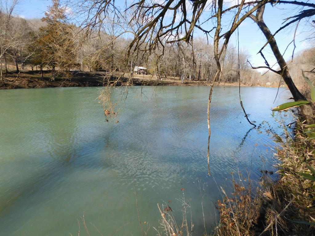 Are you looking for your own private slice of paradise in the heart of the Ozarks? Look no further than this stunning 6-acre property that borders the Little Buffalo River in beautiful Newton County, Arkansas.With over 500 feet of prime (year round) river frontage, this property offers unparalleled access to one of Arkansas' most beautiful and pristine waterways. Whether you're an avid fisherman, a kayaker, or simply looking to escape the hustle and bustle of daily life, this property is the perfect place to relax and unwind. The land itself is a nature lover's dream, with rolling hills, and stunning mountain views that provide the perfect backdrop for your dream home or cabin.