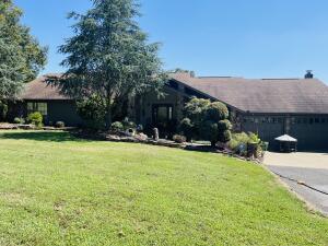 Spacious home with an amazing VEIW of the River Valley, wake up everyday with the view of a lifetime in the sunroom with a cup of coffee. This custom built home features 3000 sq ft, 3beds/3 baths, 2 rock fireplaces, a huge living room with cathedral ceilings, gorgeous wood floors, with a spacious den, and an office. Outside features 5 acres with a pond, professionally maintained landscaping, 2 car workshop, Greenhouse, Xtra Storage building and 2 patios with outside seating areas. Don't miss your chance to own this magnificent home. Call Today!