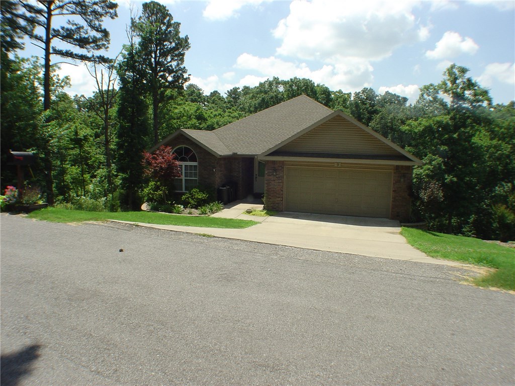 Beautiful, large family home with two living areas, both featuring gas log fireplaces. Granite counters throughout. Huge workshop/exercise/hobby room on lower level, or use it for extra storage. Quiet neighborhood with private setting makes this the perfect place for family gatherings!