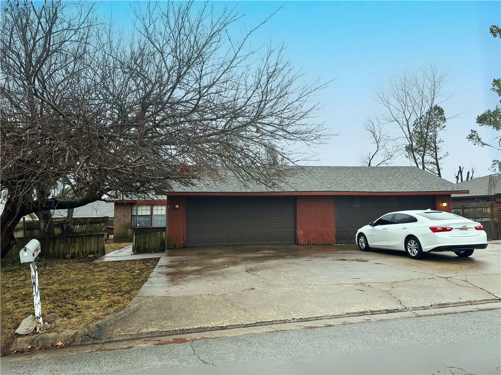 Located across from Towers Park and just five minutes from downtown Rogers, this duplex is full of potential! Each 3-bedroom, 2-bathroom unit features an oversized living area with a beautiful floor-to-ceiling brick fireplace, creating a cozy yet spacious atmosphere. The private front courtyard and porch offer the perfect spot to enjoy your morning coffee. Additionally, each unit includes a two-car garage for convenience and storage. Whether you're looking to expand your rental portfolio or secure a fantastic investment opportunity, this property is a rare find.