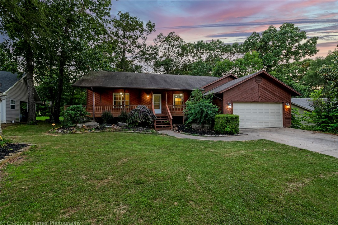 All Cedar Home..with full covered porch gives a cabin, country feel. High ceilings, open living ,dining with floor to ceiling fireplace adds a modern twist. Huge Kitchen has solid surface counter tops and chefs pantry Large fenced back yard with 2 decks and huge shade trees is a great entertainment space.15x15 area underneath for storage. Could use cosmetic updates to make it your own. It is a unique home in a fantastic location ,check it out soon.