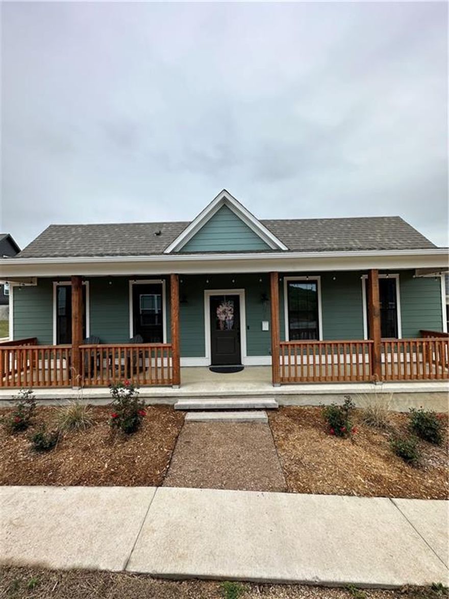 This charming fully furnished home was recently built and is now available for rent. It features one bedroom and one bathroom, making it a cozy and comfortable living space for singles or couples. As you approach the house, you'll be welcomed by the inviting front porch, perfect for enjoying a morning coffee or relaxing in the evening. Inside, the house has an open floor plan that maximizes the use of space. The living area is spacious and features plenty of natural light, making the space feel bright and airy. The kitchen is modern and fully equipped with all the necessary appliances, including a refrigerator, stove, microwave, and dishwasher. The bathroom is also modern and features a shower/tub combo. The bedroom is located at the back of the house with plenty of space and a closet.