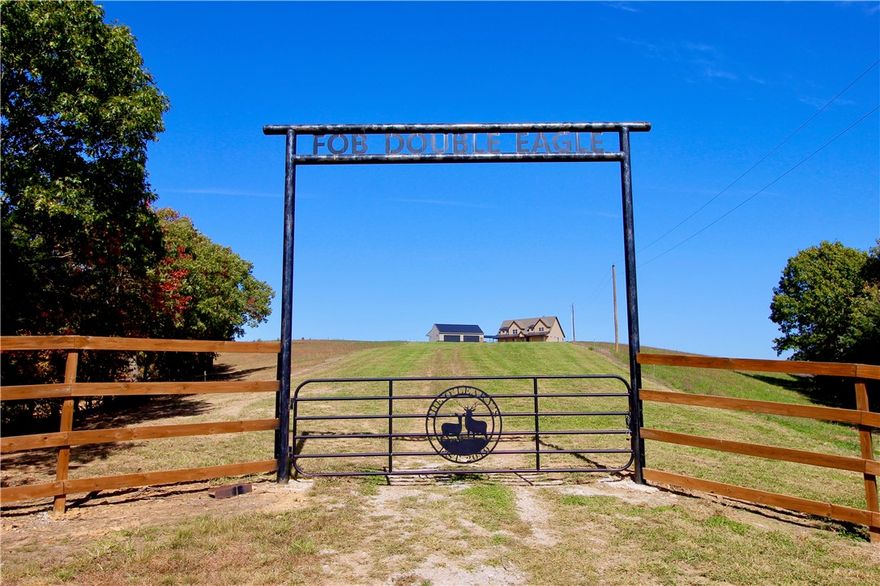 This mountain top estate property is a turn key move in ready property, to include a new Kubota tractor, Polaris Ranger, Tracker ATV, furniture and much more.Built in the year 2021, this four-bedroom, three-bathroom house stands as a testament to modern luxury harmonizing perfectly with nature's pristine beauty. Step inside, and you'll be greeted by a warm and inviting living space anchored by a stunning fireplace, fabulous woodwork, and adorned with elegant granite counters. Spanning a spacious 3000+/- square feet, this home offers room for both comfort and versatility, making it an ideal setting for growing families and memorable gatherings with friends and loved ones. One of the most captivating features of this property is the panoramic mountain views that stretch as far as the eye can see. Adding to the allure of this sanctuary, the property is graced with a seasonal waterfall and a couple meandering spring fed creeks that enhances the sense of tranquility.