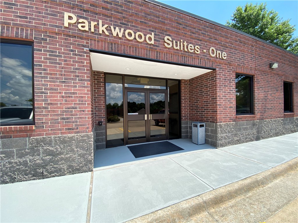 2 Modern office buildings with 10 separate units. Great investment opportunity for any business needing office space and tired of renting--Use the office that fits your needs and create income from leasing the other units. Centrally located just off exit 78---- easy access to I-49. Offices in Parkwood 101 range from 168-1300 SQ/FT - 4 of 6 offices are currently leased with unit F occupied by the property manager. The Parkwood 113 offices range from 660-1700 SQ/FT - 3 of 4 offices are currently leased. Photos are from currently vacant office spaces and property managers office- Similar finishes in the tenant occupied offices. Parkwood 113 has new permanent roof coating applied June 2109 10Yr transferrable Warranty. Fully occupied rental income for both buildings is $10,140/Month or $121,680/Year.
Sale of both buildings is preferred as irrigation, signage and trash for both buildings is combined. Separate sale of buildings may need city approval. Parkwood 101 MLS#1155142 & Parkwood 113 MLS# 1155148.