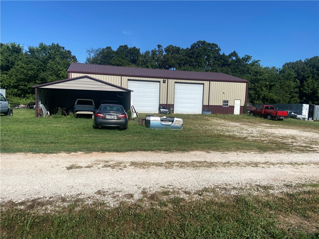 Great location and hard to find Flex Space in Farmington. Two 4,000 SF Metal Buildings on ±1.87 Acres. Both Flex Spaces are built a little differently. One has an office and one as a fully built out apartment, each have their own bathrooms. This Property is 1 Mile from Downtown Farmington & 5 Miles from I-49. Currently occupied do not disturb tenant. Call agent for showing appointment.