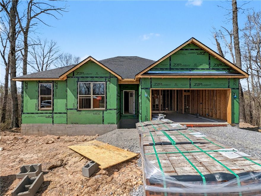 Welcome To Your Next Home! 20 Birsay Cir Is Where Smart Design Meets Everyday Comfort. This New Construction Home Brings The Perfect Blend Of Modern Finishes And Livable Layout. Walk Into A Vaulted Living Room With Statement Beam Accents That Set The Tone, Opening To A Kitchen Built For Real Life — Quartz Counters, Custom Cabinets, Oversized Island, And Natural Light That Fills The Space. The Split Plan Gives The Primary Suite Its Own Wing With A Spa-Style Bath And Walk-In Closet. Two Additional Bedrooms Handle Whatever You Need. Out Back, A Covered Deck Looks Out Over A Quiet, Tree-Lined Setting That Makes It Easy To Unwind. Quality New Construction With The Opportunity To Still Make Selections! Great Location Near Tiree Park and Boat Ramp. Easy Access To I49. Spec'd For Completion Late June 2026.