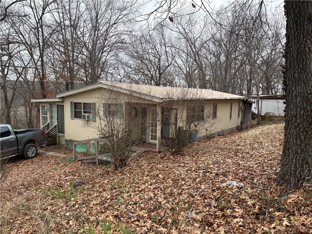 5 vacant trailers on 5 separate lots all are in varying stages of needed repairs. Location could not be better just off of Hwy 71 near Blowing Springs parks. Close to bike trails, shopping, grocery, and easy to interstate. Trailers are in the county but are included in the Bella Vista POA