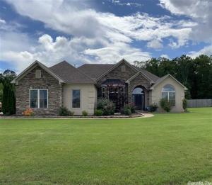 Stunning custom built home in the sought after community of Cresthaven. This home has it all; 3 bedrooms with a bonus room, 2 and a half baths, raised ceilings in living and master, hardwood floors, stainless steel appliances, gas range, gas fireplace, spacious master bedroom, large soaker jetted tub in master, storage galore, large laundry room, safe room, huge backyard with fire pit, privacy and so much more!