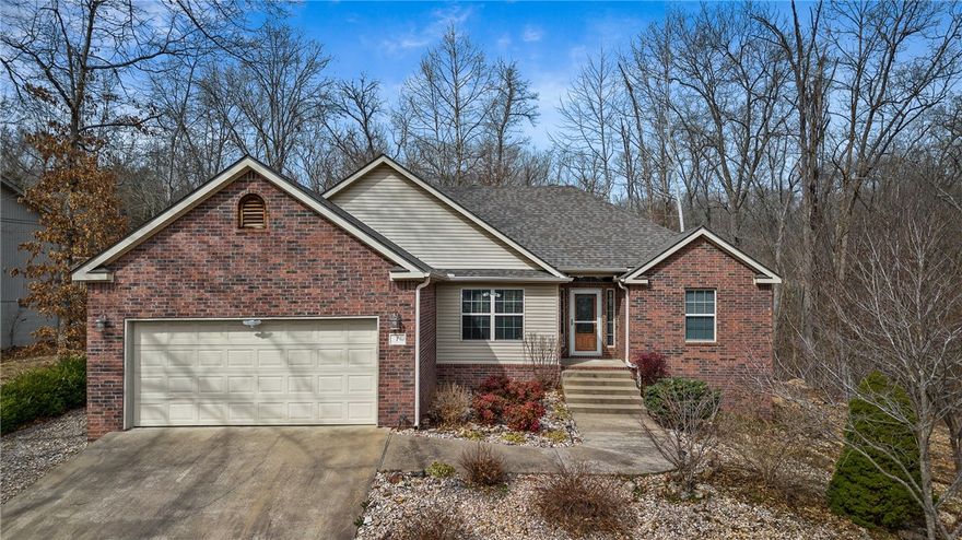 Welcome to 7 Aycock Lane in Bella Vista, a prime location just across the street from the Lago Vista bike trail. This functional home offers instant access to outdoor recreation. It boasts fresh updates, including brand new carpet and appliances, making it move-in ready. Enjoy the tranquility of the setting while still being close to Bella Vista’s lakes, golf courses, and trail system. With an easy drive to Bentonville and Rogers, this is an excellent opportunity for full-time living, a weekend retreat, or an investment in a highly desirable area.