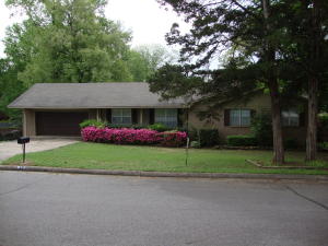 UPDATED HOME WITH 4 BEDROOMS AND 3 BATHS SITS IN AN ESTABLISHED NEIGHBORHOOD IN THE HEART OF RUSSELLVILLE. AMENITIES INCLUDE NEW APPLIANCES AND GRANITE COUNTERTOPS IN THE KITCHEN, HARDWOOD FLOORING, DEN WITH FIREPLACE, DECK, STORAGE BUILDING, FENCED BACKYARD, AND AN EXTRA LARGE LOT.