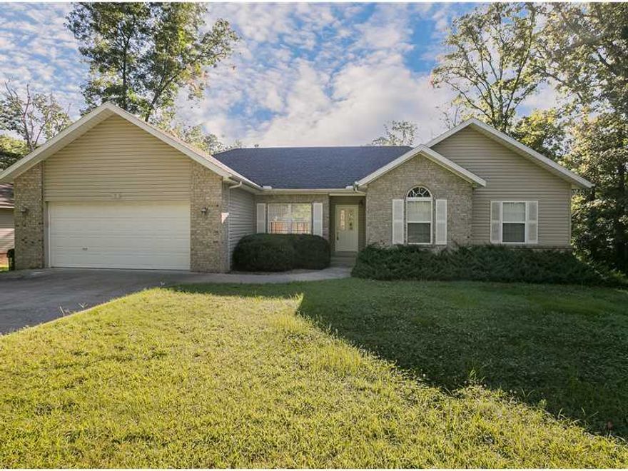 WHAT'S NOT TO LIKE!  BEAUTIFULLY MAINTAINED HOME WITH EAT-IN KITCHEN, SCREENED DECK + OPEN DECK, FENCED YARD, BASEMENT WORKSHOP AND BELLA VISTA SEWER.  ARCHED DOORWAYS ADD INTEREST, CENTER WORK ISLAND IN KITCHEN, WHIRLPOOL TUB + STEP-IN SHOWER IN MASTER,SOLID SURFACE COUNTERTOPS, TILE BACKSPLASH, SOME NEW CARPET & TILE.  SELLER IS PROVIDING 2-10 WARRANTY FOR BUYER.