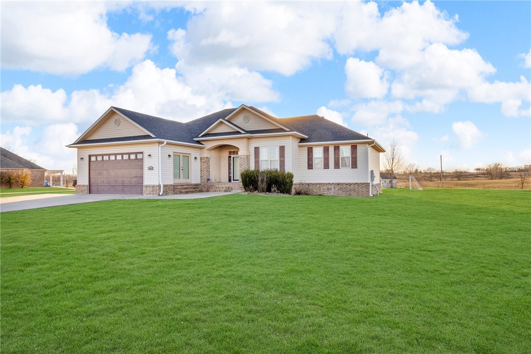 Looking for a home outside of the city yet close to everything? Look no further! Come check out this beautiful 4 bedroom 3 bath home siting on 1.01 flat acre conveniently located about 1/2 a mile from I-49 and a quick 15-20 min drive to Bentonville and Bella vista. Come and enjoy beautiful sunrise/sunsets on the back deck. This home offers granite counter tops, stainless steel appliances, and the option of gas or electric stove. Additional features include home office and garage that was converted to a bedroom with bathroom and its own entrance (NO GARAGE). Some recent updates to home include motioned censored closet lights, new lighting, new roof and new water heater. The 200 sqft shed in the back offers attic space for extra storage along with a 60 sqft metal shed on side of house.
Enjoy the country living with no HOA/POA, you can have a small farm or whatever your heart desires.
Come and check out this home and all it has to offer!