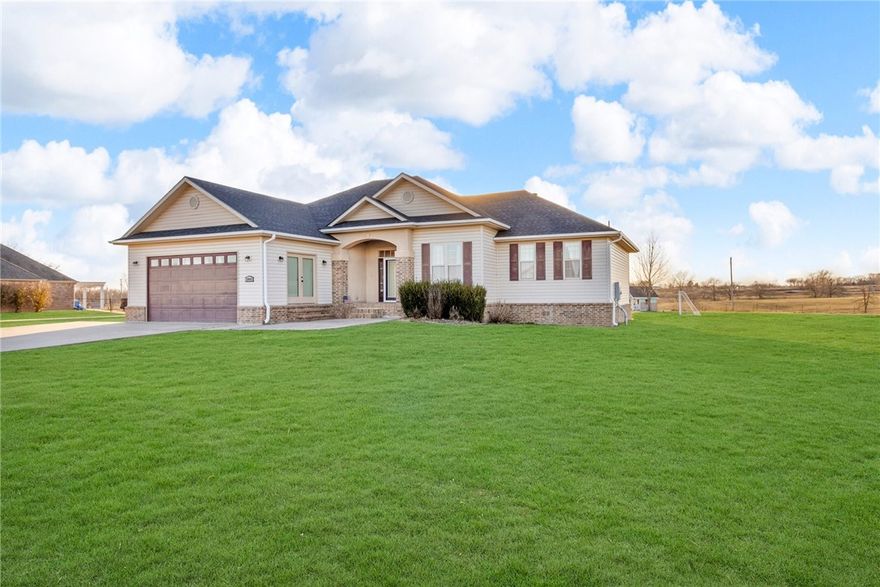 Looking for a home outside of the city yet close to everything? Look no further! Come check out this beautiful 4 bedroom 3 bath home siting on 1.01 flat acre conveniently located about 1/2 a mile from I-49 and a quick 15-20 min drive to Bentonville and Bella vista. Come and enjoy beautiful sunrise/sunsets on the back deck. This home offers granite counter tops, stainless steel appliances, and the option of gas or electric stove. Additional features include home office and garage that was converted to a bedroom with bathroom and its own entrance (NO GARAGE). Some recent updates to home include motioned censored closet lights, new lighting, new roof and new water heater. The 200 sqft shed in the back offers attic space for extra storage along with a 60 sqft metal shed on side of house. 
 Enjoy the country living with no HOA/POA, you can have a small farm or whatever your heart desires. 
Come and check out this home and all it has to offer!