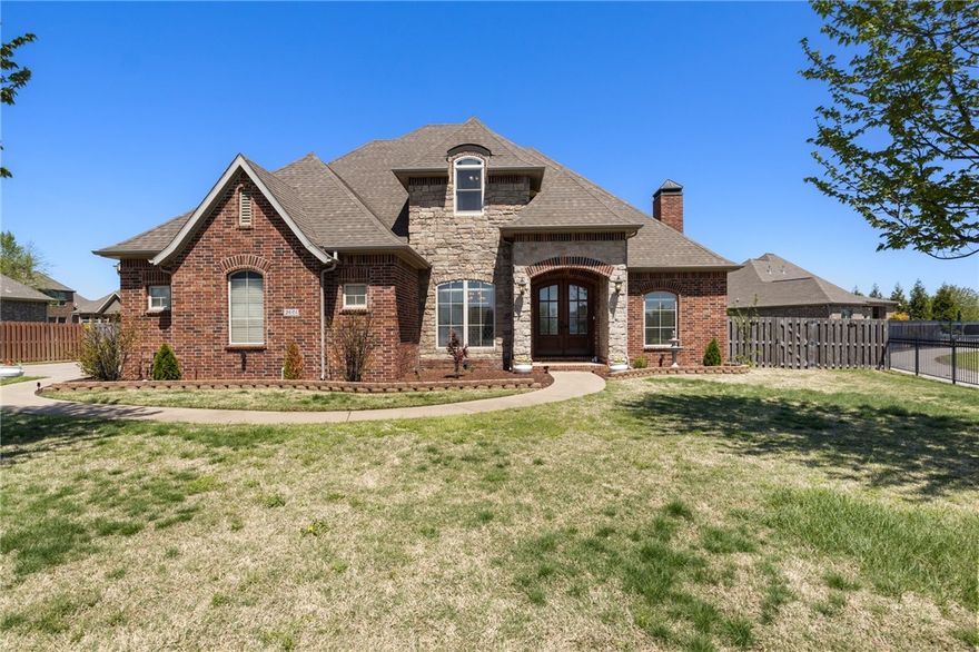 Elegant 4 bed, 3.5 bath home on a quiet cul-de-sac with stunning water views! This spacious layout includes a large family room, gourmet kitchen with granite countertops, island, raised bar, and breakfast nook. Enjoy a formal dining room, dedicated office with cathedral ceiling, and a versatile bonus/media room upstairs. Beautiful finishes throughout—quarts countertops in baths, newer wood floors downstairs, and newer Andersen windows upstairs. The second floor features three bedrooms, two full baths (one shared between two bedrooms), and extra storage. Relax on the peaceful back patio or by the cozy gas fireplace. Neighborhood amenities include a pool, playground, and gated fishing pond with walking trail. Prime location near Razorback Greenway, Fairview Elementary, I-49, and all Northwest Arkansas has to offer. This home has it all—style, space, and serenity. Don’t miss it!