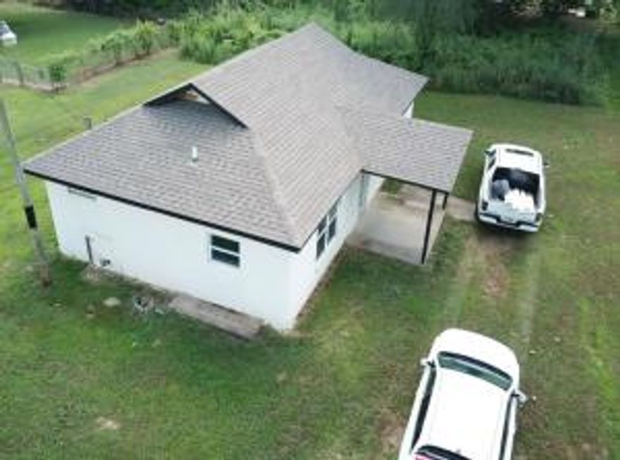 Seller has already done alot of the remodel work such as New H&A system New roof, New Windows, New Sheetrock and trim, New cabinets, New counter tops New Shower/Tub Combo and upgraded electrical wiring and panel box.New Buyer can finish up the rest and reap all the rewards!!!