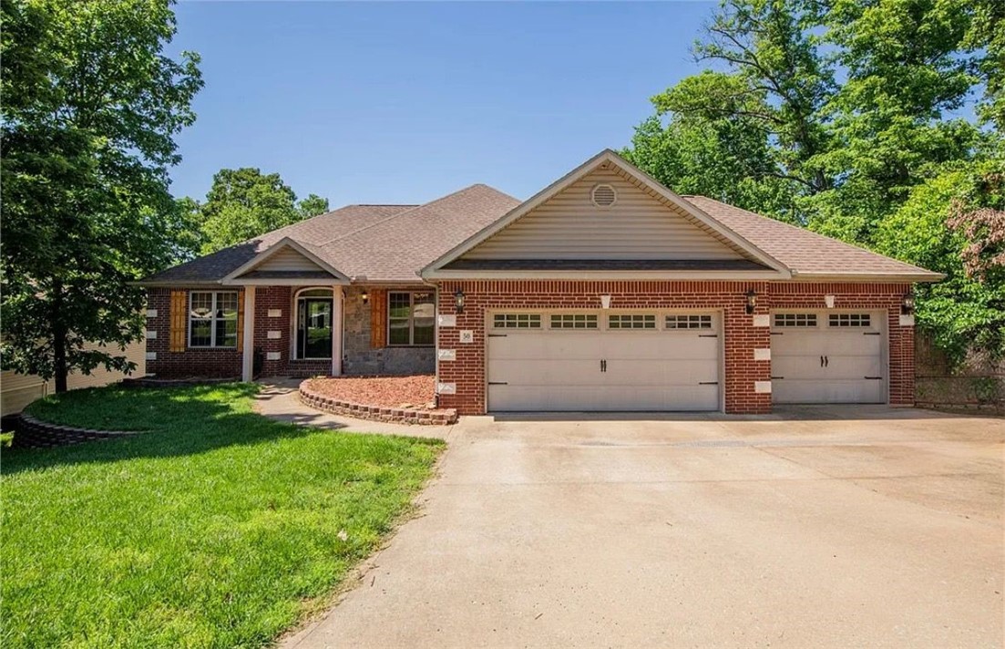 Seller is offering a $10,000 Flooring Allowance with accepted offer!!! Beautiful 4-bed , 3-bath home with 3,548 sq ft in Bella Vista’s scenic Lakenheath neighborhood! Enjoy nearby mountain bike trails and Lake Rayburn & Lake Ann. Main level features formal dining, spacious kitchen, breakfast nook, 3 bedrooms, 2 baths, laundry room, and covered deck. Lower level includes a large family room with kitchenette, study, bonus room, craft room with custom cabinets, office, bedroom, full bath, and custom deck with planters. Two cozy stone fireplaces add warmth and charm. Ample storage and a 3-car garage with sink complete this stunning home.