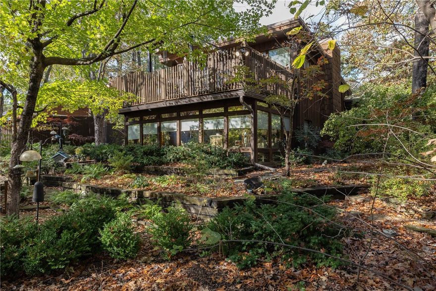 One of a kind, charming tri-level home, located just two blocks from Razorback Stadium, has been well maintained and features some updates. Owned by the same family for 41 years, it sits on a beautiful park-like corner lot with mature landscaping, multiple flagstone paths, and a spacious deck. Inside, the home offers 3 bedrooms, 2.5 baths, a sunroom, living room, and a den, providing multiple living spaces. Additional features include a partial home generator and central vacuum system for added convenience. With a prime location near the University of Arkansas, Fayetteville High School, downtown, and the business district, this home is perfect for anyone who loves being in the heart of the vibrant