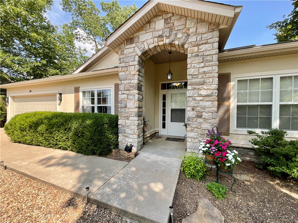Beautiful 3 Bed 2 Bath home on level, corner lot. Located steps from Dogwood golf course and back 40 trails. Split floor plan and open living/dining/kitchen space. On Sewer. Screened-In concrete porch overlooks private flat backyard. Nice primary bedroom suite with walk-in closet. Large Laundry room and plenty of storage. Well maintained home with an excellent floorplan. New roof 2022. Leaf shield gutters 2023. Dishwasher 2023. Garage door 2021. HVAC 2017. Window coverings in primary bedroom donāt convey.