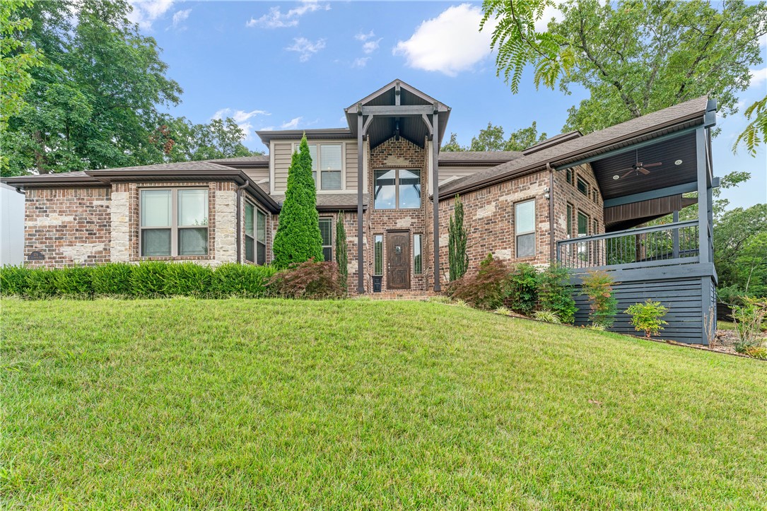Spectacular luxury residence perfectly located in Fayettevilleās sought-after neighborhood, offering easy access to the University of Arkansas, downtown, and major expressways. Bright, airy rooms reveal breathtaking, unobstructed views through expansive windows that bring the outdoors in. The chefās kitchen boasts quartz countertops, oversized walk-in pantry, and custom cabinetry crafted for style and practicality. A cozy sitting area adjacent to the dining room offers an inviting space for relaxation or entertaining. Hardwood flooring spans the main level, complemented by plush new carpeting in the elegant primary suite and upstairs bedrooms. A generously sized laundry room offers practicality, while the bonus room, thoughtfully pre-wired for surround sound, provides an exquisite setting for entertainment. Advanced smart wiring and security systems, including 4K cameras, along with ample closet space, central vacuum, and smart irrigation, contribute to the homeās exceptional comfort and sophistication.