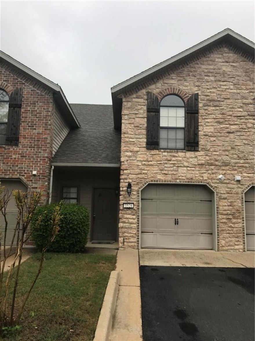 Two story condo with 2 en suite bedrooms upstairs, dine in kitchen and living room with half bath downstairs. Electric fire place in living room. Semi-private patio in back. Easy access to I-49 and University.