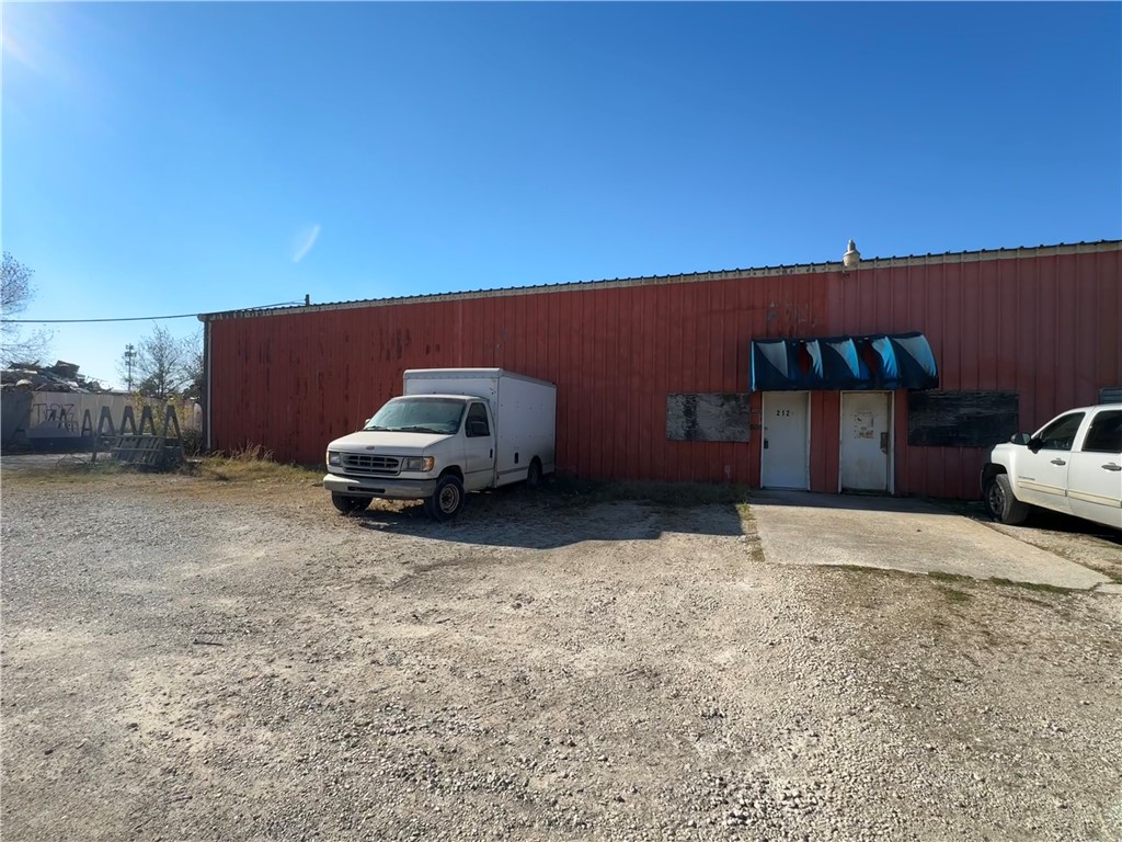 Large warehouse space close to Downtown Rogers, with 2 commercial-sized garage doors. 2 Private bathroom and office spaces. Corner lot and unit. Property could be utilized for multiple uses; the possibilities are endless.