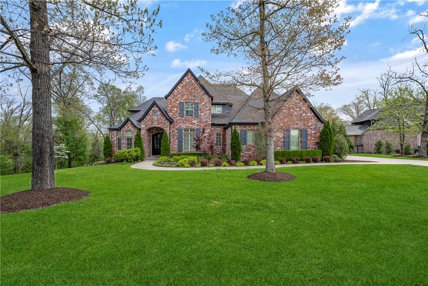 Discover serenity in Versailles Subdivision with this immaculate home set on a sprawling 1.96acre level lot. Recently adorned with a fresh coat of paint, this residence offers an inviting open floor plan, 4 bedrooms(1 on main level ), 3 1/2 bathrooms, accentuated by generously proportioned rooms and an abundance of natural light. The heart of the home is the meticulously designed kitchen, boasting modern appliances, ample storage space & large pantry. From here, you'll enjoy panoramic views of the lush greenery surrounding the property, creating a seamless connection between indoor & outdoor living.  This lot is spectacular!  Step outside to the expansive deck, complete with grill, fireplace, TV and speakers, perfect for hosting outdoor gatherings. Adjacent to the deck, is the pool & a covered seating area provides a shaded retreat on warmer days, ideal for enjoying a morning coffee or evening cocktail. Both the siding and deck were painted & stained in 2023,Roof 2024 ensuring fresh aesthetic for years to come.