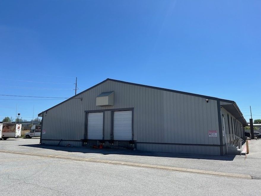 Hard to find cross dock warehouse in NWA with offices, showroom/conference room, two restrooms, drive in door and dock doors.
