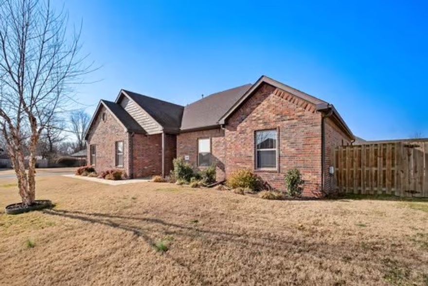 Immaculate  1 level Brick home on desirable corner lot w side load garage in Battlefield Estates., Iron fencing on south side with extra large gate for mowers, wood privacy fence bordering neighbors.. Large custom built on site storage building 12x 20 with window, double doors, and entry ramp;  raised garden bed on north side of home. Gorgeous wood flooring throughout living space, ceramic tile in wet areas, carpet in bedrooms. Granite counter tops with stainless steel appliances, gas Range. Large eat in kitchen, w pass through window opening into Living room. Elevated ceilings and crown molding throughout. Huge over sized master bedroom 16.5x 14.5, tre-ceilings with ceiling fan. Large walk in tiled shower, separate whirlpool tub, double vanity, 2 master closets. Increased parking spaces to 3 in width with new cement pad. Covered porch and patio to enjoy this sidewalk lined neighborhood and landscaped lot.