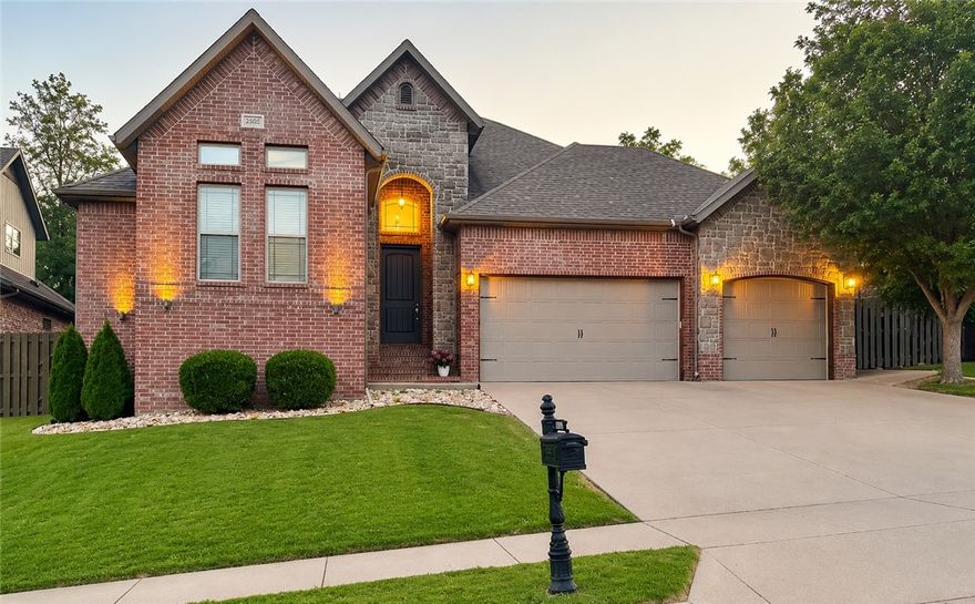 Located in popular Grammercy Park, this beautifully crafted two-level all brick and stone home offers the perfect blend of space, style, and comfort.  This home is designed for both everyday living and entertaining with spacious living areas, bedrooms, and flex space upstairs. The inviting living room showcases tall ceilings and a cozy fireplace, creating a warm and open atmosphere. The large eat-in kitchen is makes meal prep a breeze with granite countertops, a gas range, ample cabinetry, and a convenient walk-in pantry. Wood floors flow throughout the main living areas, adding elegance and durability. A formal dining room provides the perfect setting for gatherings and special occasions. The covered patio with fireplace is perfect for enjoying cool fall evenings. The three-car garage offers plenty of space for vehicles and storage. Nestled in a quiet subdivision, residents enjoy access to a community pool and clubhouse, making this home an ideal retreat with neighborhood charm and modern amenities.