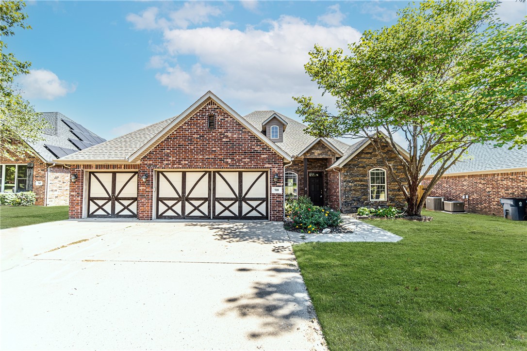 Convenient to schools and WalMart Home Office. Close to cul-de-sac lot in small subdivision. Bedrooms on main level w/huge bonus upstairs. Wood floors, crown molding, custom cabinets, privacy fence. Master suite w/ walk-in shower, whirlpool tub and WIC