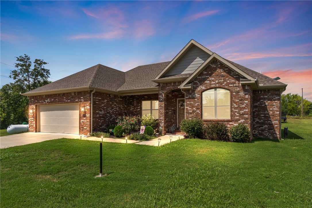 This home boasts an open floor plan with 3 bedrooms, 2 baths, and a flex room that provides the perfect space for a home office or an number of other uses as well as being on a double lot. You'll apprciate elegant finishes such as custom cabinets, granite countertops, stainless appliances, a gorgeous fireplace and crown molding throughout You'll enjoy the generous sized Kitchen/Dining area with ample cabinetry and large island. The master suite boasts and over-sized closet, tray ceiling, shower, and whirlpool tub. Last but not least, you'll appreciate the covered back patio and level and spacious back yard! Let's make this house your home! Schedule your private tour today.