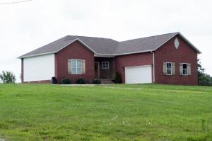NICE LIKE NEW HOME!!!! You will love this 3BR/2BA layout with Master Bedroom/Bathroom on opposite side of living area split away from other Bedrooms & Bath. Walk-in closet, Jetted Tub & Stand Up Shower. 10ft ceilings throughout the home & a tray ceiling in Master Bedroom. HUGE door-sized windows in Living & Dining Rooms that allow you to take in the serene beauty of the Ozarks! Includes 2-car garage, rear deck sitting on approx. 1 acre. Just off pavement located in Bergman school district. You will want to see this beautiful home! Perfect for anyone!!