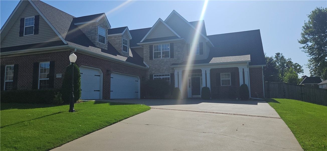 Nice Home is desired Stonewall subdivision. Home features 5 bedrooms, 3 full bathrooms, 3 car garage, large fenced in backyard with covered patio. New wood floors downstairs, new carpet in master bedroom, master bath fully equipped with walk in closet, jacuzzi tub, and separate tiled shower. Hearth room comes with large gas log fireplace, huge bonus room upstirs with office area beside, formal dinning-room, jack & jill bathroom upstirs. Come take a look wont last long.