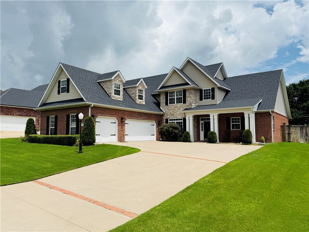 Nice Home is desired Stonewall subdivision. Home features 5 bedrooms, 3 full bathrooms, 3 car garage, large fenced in backyard with covered patio. New wood floors downstairs, new carpet in master bedroom, master bath fully equipped with walk in closet, jacuzzi tub, and separate tiled shower. Hearth room comes with large gas log fireplace, huge bonus room upstirs with office area beside, formal dinning-room, jack & jill bathroom upstirs. Come take a look wont last long.