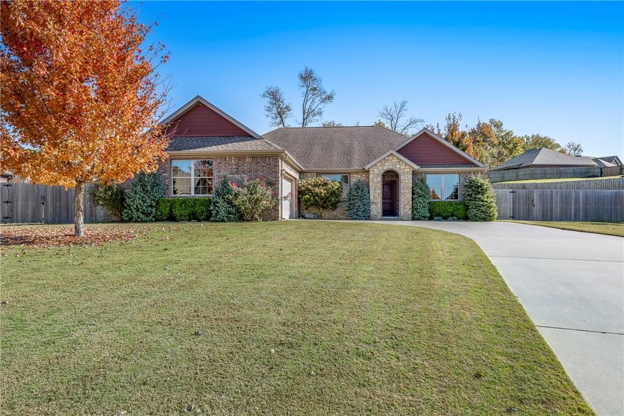 When you combine an amazing location, a functional floor plan and stylish, modern finishes you get a beautiful home you'll love for years to come! Conveniently located in the middle of NWA in a friendly neighborhood that offers its own pool and playground, you will love everything about this well kept brick home.  3 spacious bedrooms plus a separate home office will give you space for everyone and you'll love the modern and striking epoxy floor throughout. Enjoy the view across the open layout from your modern kitchen and you'll appreciate the granite counters, lots of cabinets and more. Around the corner is the oversized laundry, a relaxing main bedroom suite and a side load garage make this home stand out. Offering one of the larger lots in the area, this amazing yard has room for friends, activities and pets.  Don't miss this beautiful home with style for days!  Come see this one right away and you won't want to leave